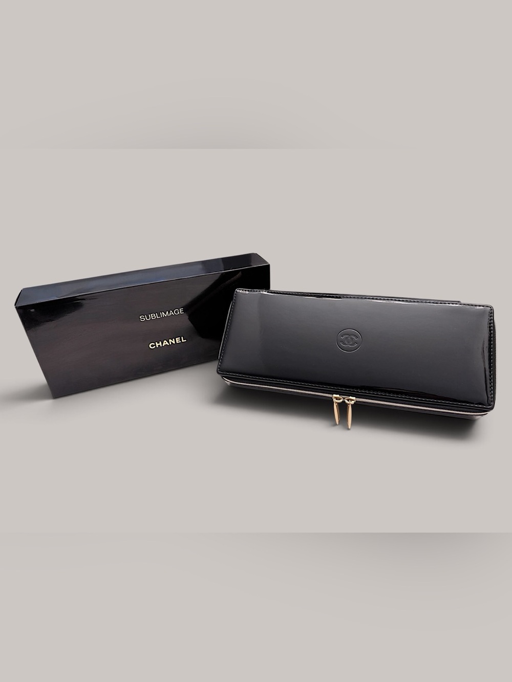 CHANEL Black Sublimage Patent Leather Zip Cosmetic Case with Gold Accents